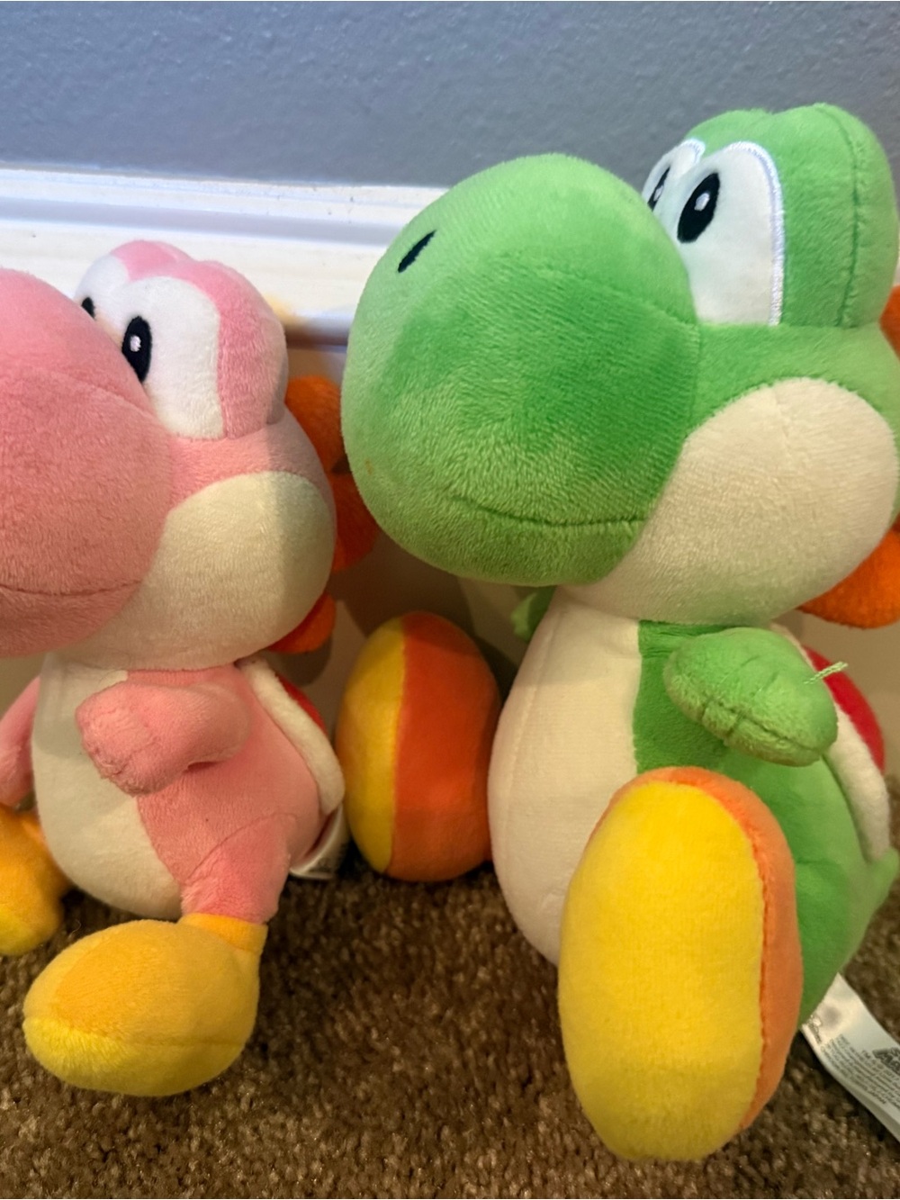 Nintendo Yoshi Plush Pair - Green and Pink with Yellow/Orange Accents